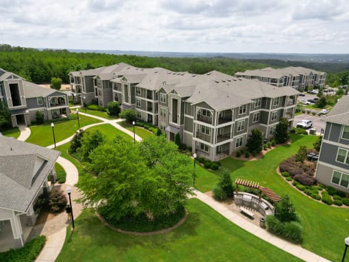 an aerial view of an apartment complex at The Crest at Laurel Canyon Apartments, Georgia, 30114