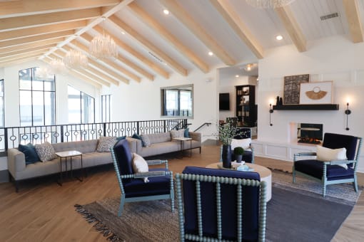 a living room with couches and chairs and a fireplace at The Crest at Acworth, Acworth, GA, 30102