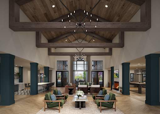 A large room with a wooden ceiling and a chandelier hanging from it.