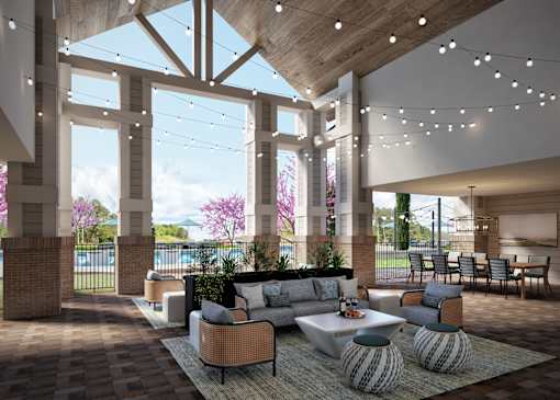 A modern living room with a large window and a view of the outdoors.