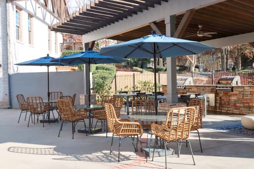 The Crest at Berkeley Lake grilling stations on the pool deck located in Duluth, GA 30096