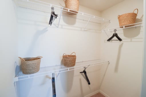 Apartment home walk-in closet with shelving located in Naples,FL at The Crest at Naples, Florida