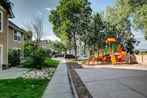 a playground in the middle of a sidewalk