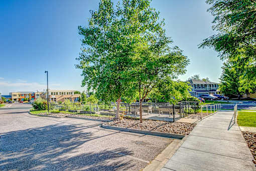 the preserve at ballantyne commons community entrance with sidewalk and tree