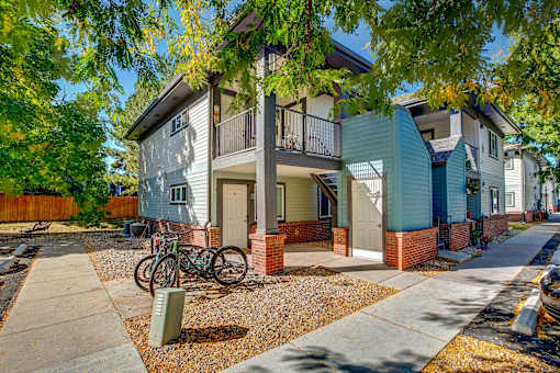 a home with a bike parked in front of it
