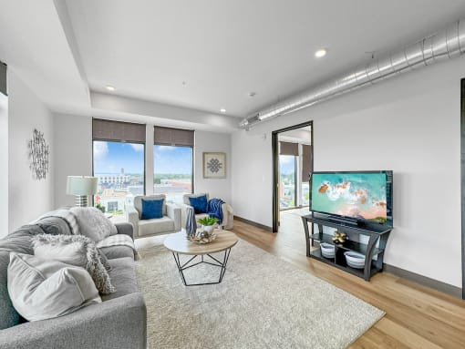 a living room with a couch and a tv