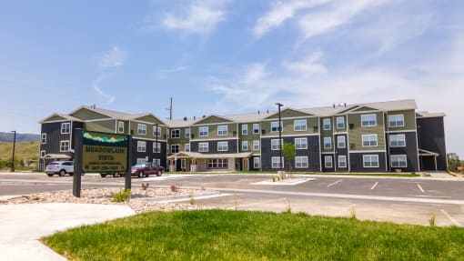 Image of building, parking, and property sign
