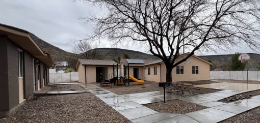 playground and basketball court in front of a unit