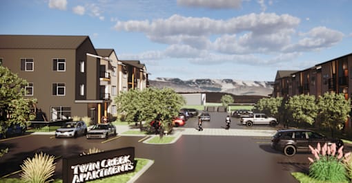 A rendering of Twin Creek Apartments complex with cars parked in the off street parking lot