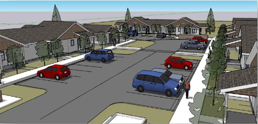 A street view of Polson Gardens showing cars parted in front of units.