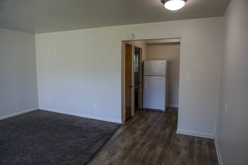 Living room and kitchen at Silverstone Apartments in Warren, Michigan