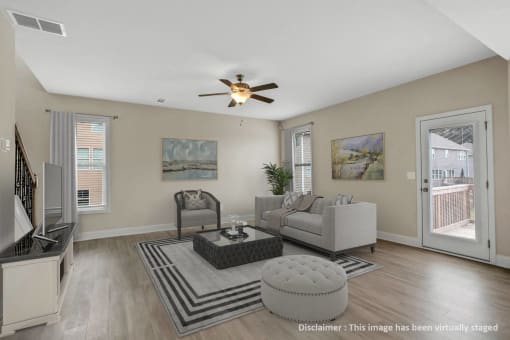 a living room with a couch and a coffee table