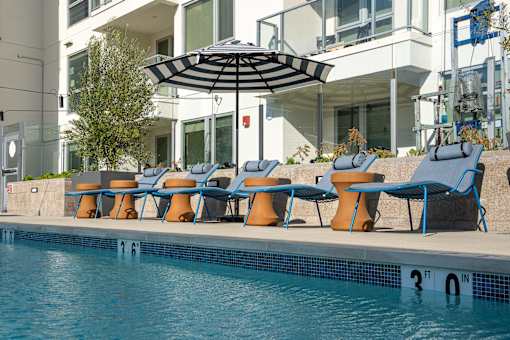 A pool with a 3 foot deep sign.