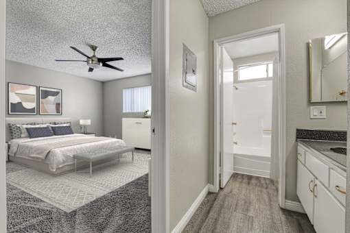 a bedroom and a bathroom with a ceiling fan