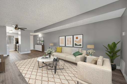 an open living room with a couch and a coffee table