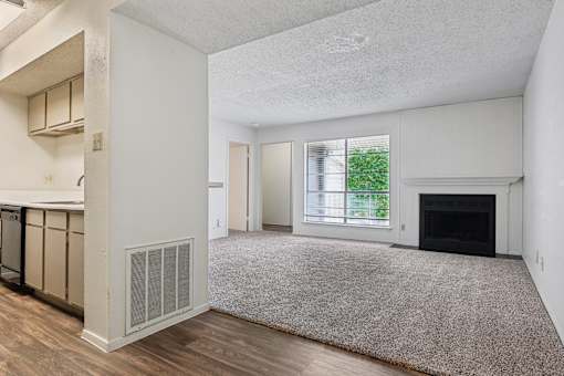 Carpeted Living Room at Abbey Glenn Apartments, Waco, Texas
