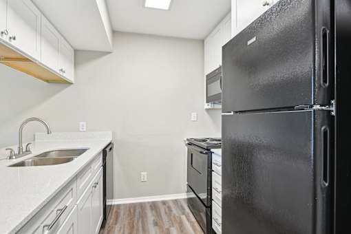 Kitchen Fridge at Abbey Glenn Apartments, Texas