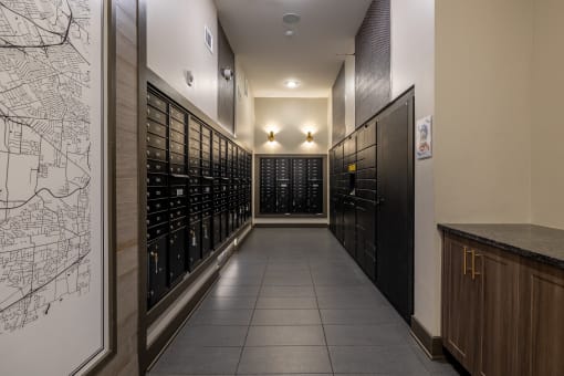 a long hallway with wine racks and a map on the wall