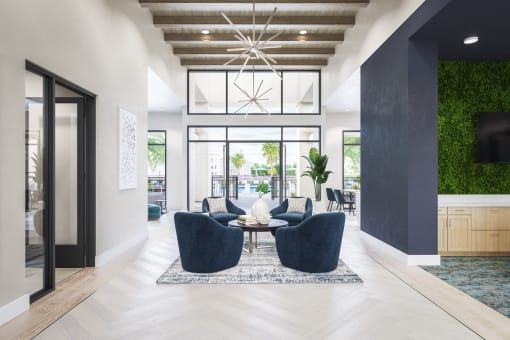 a living room with blue chairs and a table