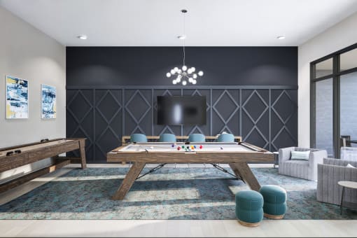 a game room with a pool table and a tv