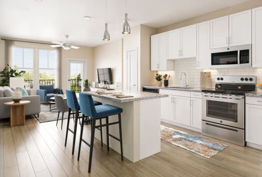 an open kitchen and living room with an island with blue chairs