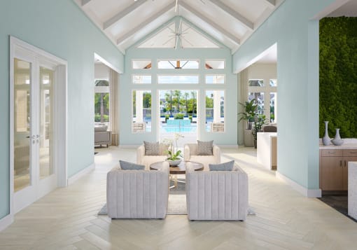 a lounge  with blue walls and white furniture and a pool