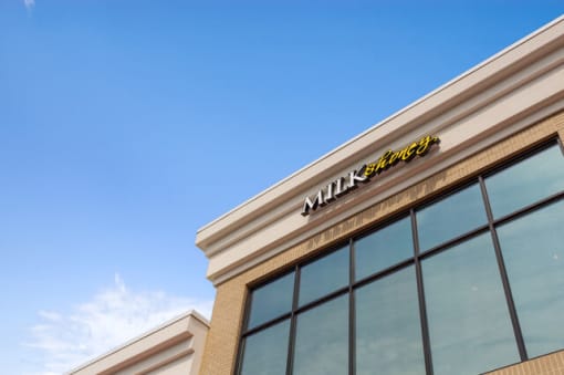 a walmart store with a blue sky in the background