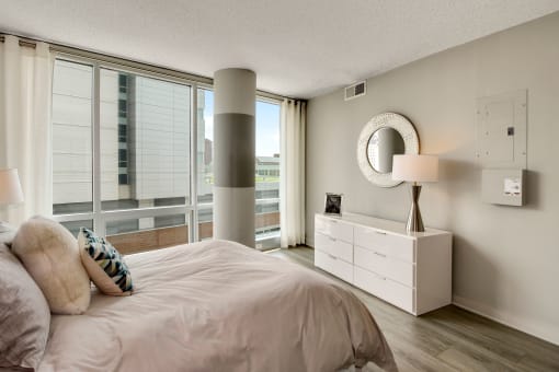 Spacious bedroom with city views at The Zenith, Baltimore