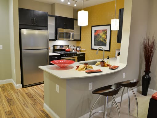 Fitted Kitchen With Island Dining at Mira Upper Rock, Rockville, 20850