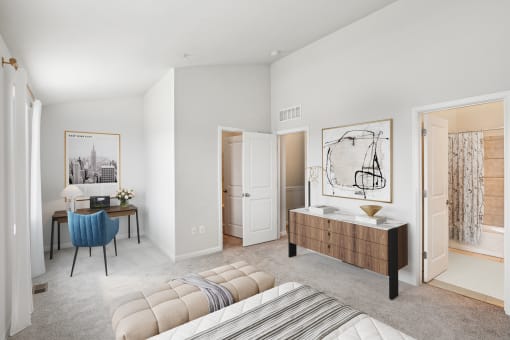 a bedroom with a bed and a desk and a mirror at Refinery Row, Baltimore, MD 21224