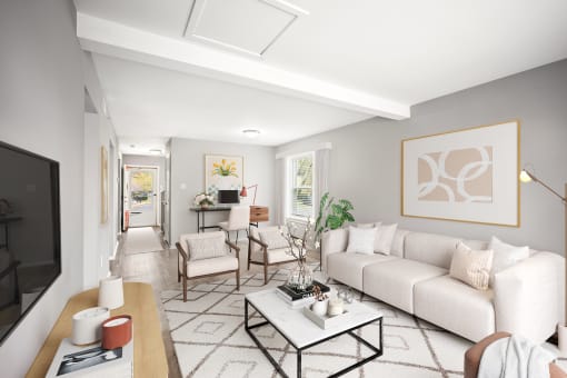 a living room with a couch and a table at Villages at Morgan Metro, Landover, Maryland, 20785