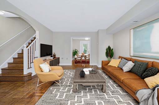 Living Room with Staircase at Falkland Chase, Silver Spring