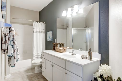 a bathroom with a sink and a shower and a toilet at MetroPlace at Town Center, Maryland, 20746