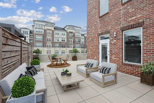 Patio with Couch at Midtown at Camp Springs, Camp Springs, 20746