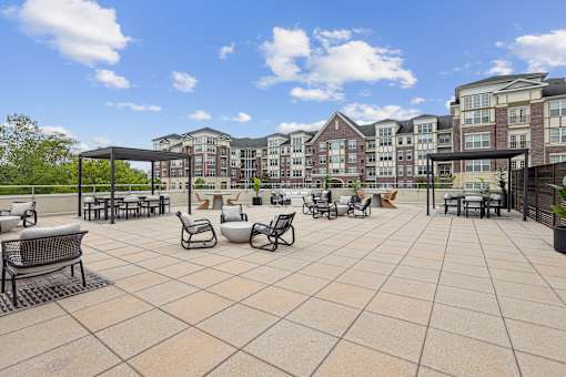 Patio with table and chairs at Midtown at Camp Springs, Camp Springs, MD, 20746