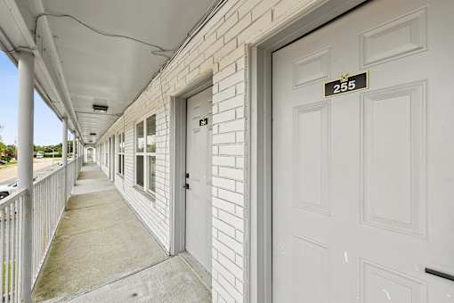 A white door with the number 255 on it.