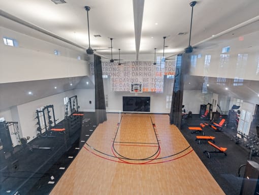 Expansive fitness center with basketball court