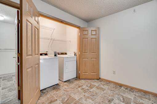 A laundry area with a washer and dryer.