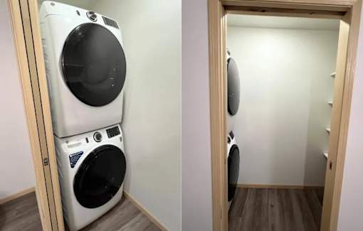 a washing machine and a dryer in a laundry room