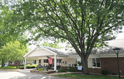 a house with an american flag in front of it