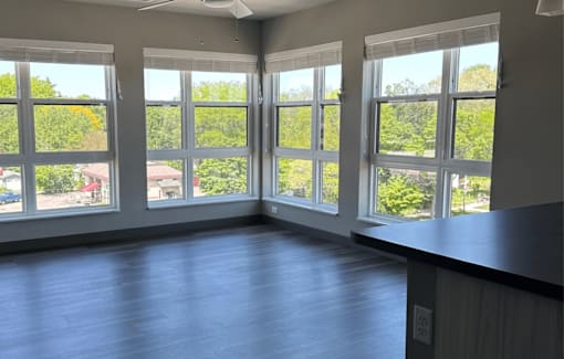 an empty room with a large window