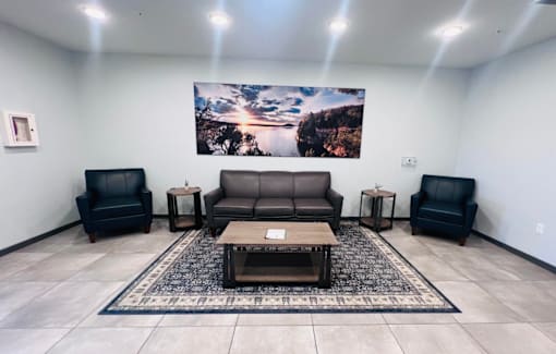 a living room with couches and a coffee table