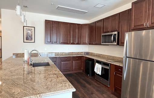 The Madisonian, Senior Housing in Madison WI. Affordable one bedroom apartments, two bedroom apartments and three bedroom townhomes. New building. No smoking. Managed by Wisconsin Management Company, 1829 Aberg Ave