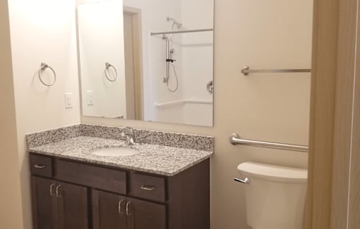 The Madisonian, Senior Housing in Madison WI. Affordable one bedroom apartments, two bedroom apartments and three bedroom townhomes. New building. No smoking. Managed by Wisconsin Management Company