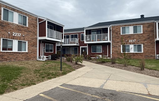 Apartment complex with the number 2237 on the building.
