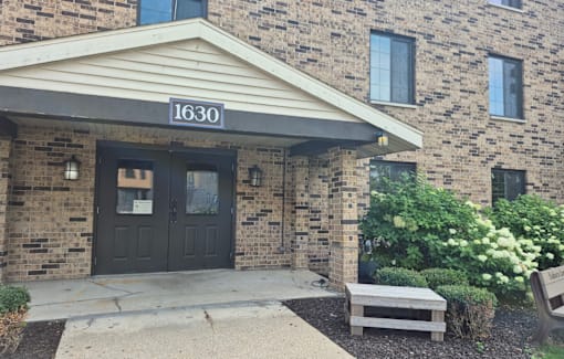 The front of a building with the number 1630 on it.