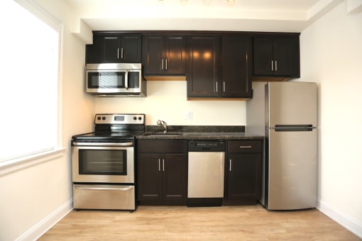 Kitchen with stainless steel appliances at The Gallery Midtown Apartments in Richmond, VA
