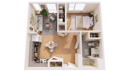 A dollhouse living room with a couch, coffee table, and potted plant.