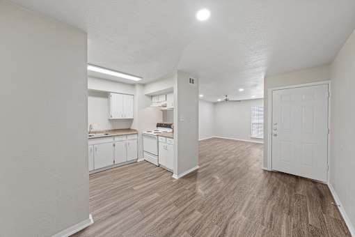 Open concept living and dining area with kitchen at Parks on the Green Apartments, Temple
