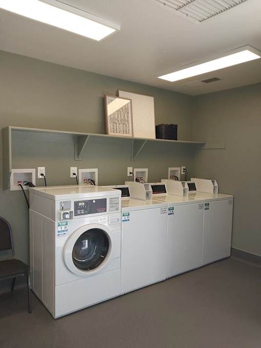 A laundry room with a washer and dryer.